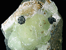 Mineral specimen: Sphalerite and Clacite on Prehnite from Millington Quarry, Millington, New Jersey.