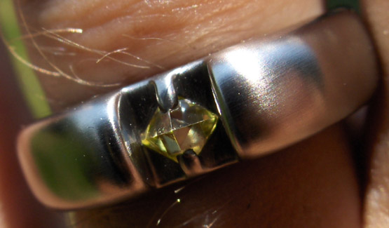 023 ct octahedral Brazilian yellow diamond in a wedding ring created by