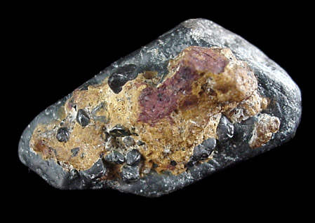 Stibiotantalite on Tantalite from Greenbushes tinfield, Western Australia, Australia