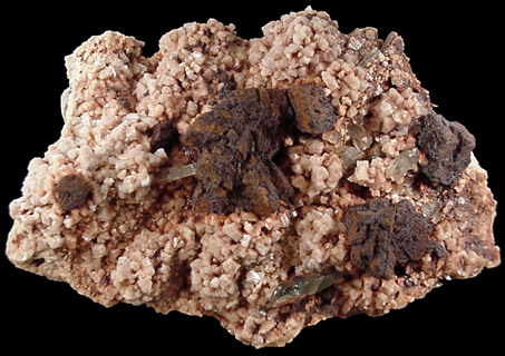 Goethite pseudomorphs after Siderite on Microcline from Crystal Creek, Florissant, Teller County, Colorado