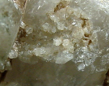 Phenakite on Quartz from Lord Hill Quarry, Stoneham, Oxford County, Maine