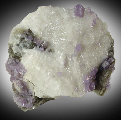 Fluorapatite on Albite from Emmons Quarry, southeastern slope of Uncle Tom Mountain,  Greenwood, Oxford County, Maine