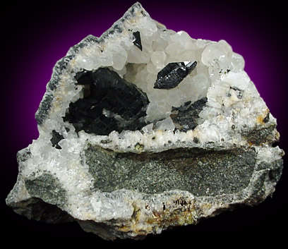 Babingtonite on Calcite from Lane's Quarry, Westfield, Hampden County, Massachusetts