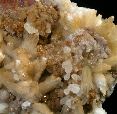 Willemite, Calcite, Barite on Hematite (fluoresces orange and green under UV) from Namibia