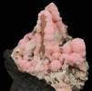 Rhodochrosite over Quartz with Barite from N'Chwaning II Mine, Kalahari Manganese Field, Northern Cape Province, South Africa