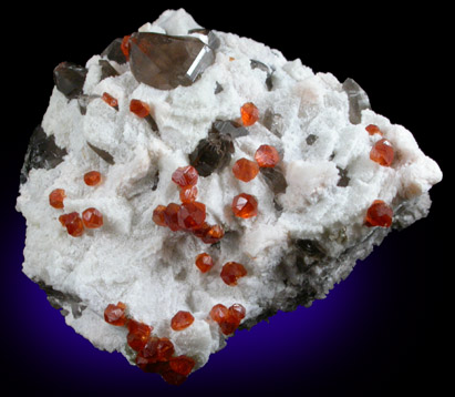 Spessartine Garnet and Smoky Quartz on Microcline from Putian, Tongbei-Yunling District, Fujian Province, China