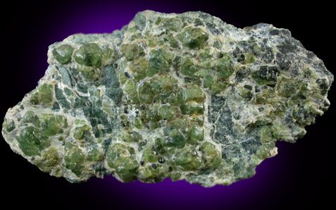 Andradite var. Demantoid Garnet from Alpe Franscia, Val Malenco, Lombardia, Italy