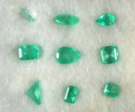 Beryl var. Emerald (set of nine faceted gemstones) from Muzo Mine, Vasquez-Yacopi Mining District, Colombia