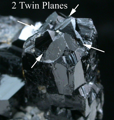 Cassiterite (twinned crystals) from Huanuni District, Dalence Province, Oruro Department, Bolivia