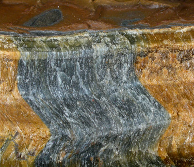 Quartz pseudomorph after Crocidolite (Tiger-Eye) from headwaters of the Orange River, Griqualand West, South Africa