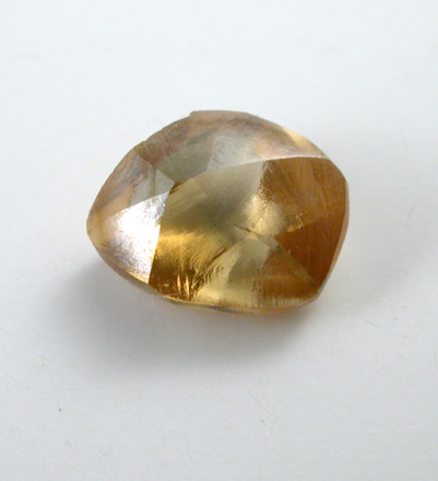 Diamond (0.53 carat yellow-orange crystal) from Free State (formerly Orange Free State), South Africa