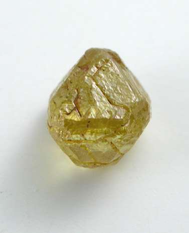 Diamond (0.42 carat yellow octahedral crystal) from Diamantino, Mato Grosso, Brazil