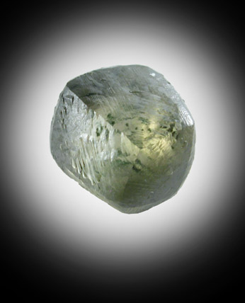 Diamond (1.15 carat green-yellow dodecahedral crystal) from Orapa Mine, south of the Makgadikgadi Pans, Botswana