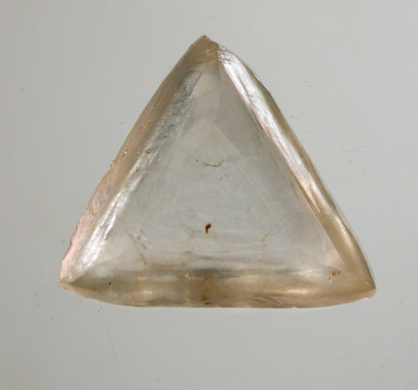 Diamond (1.85 carat macle, twinned crystal) from Oranjemund District, southern coastal Namib Desert, Namibia