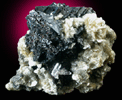 Cassiterite (twinned) on Muscovite from Xuebaoding Mountain, Pingwu, Sichuan, China