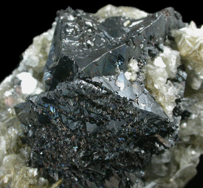 Cassiterite (twinned) on Muscovite from Xuebaoding Mountain, Pingwu, Sichuan, China