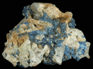 Lazulite in Andalusite from Champion Mine, 6 km WSW of White Mountain Peak, White Mountains, Mono County, California