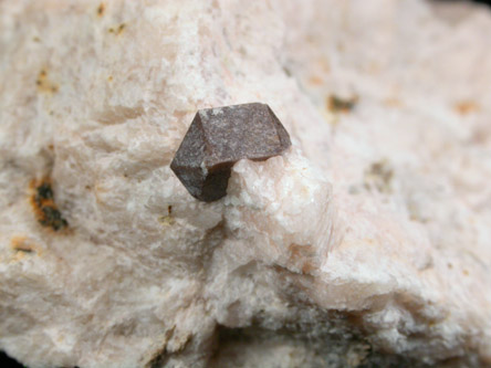 Zircon from Freeman Mine, Tuxedo, 3.2 km south of Zirconia, Henderson County, North Carolina