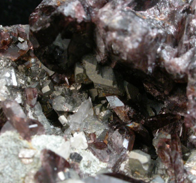 Axinite-(Fe) and Lollingite from Colebrook Hill, near Rosebery, Tasmania, Australia