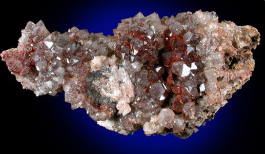 Quartz with Hematite inclusions from Musclow Road, Bird's Creek, Ontario, Canada