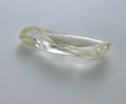 Diamond (0.63 carat yellow elongated crystal) from Finsch Mine, Free State (formerly Orange Free State), South Africa