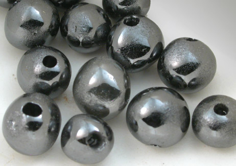 Diamond (polished black diamonds drilled for use as beads) from South Africa