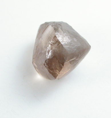 Diamond (0.96 carat brown dodecahedral crystal) from Oranjemund District, southern coastal Namib Desert, Namibia
