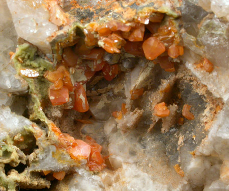 Wulfenite on Quartz from Manhan Lead Mines, Loudville District, 3 km northwest of Easthampton, Hampshire County, Massachusetts