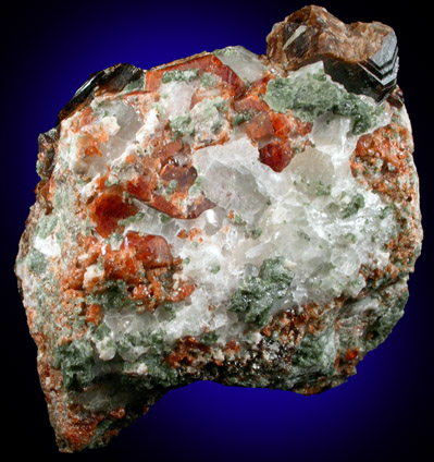 Grossular Garnet, Vesuvianite, Pyroxene, Calcite from north shore of Panther Pond (Camp Hinds), Raymond, Cumberland County, Maine