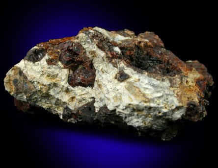 Bismutite and Almandine Garnet from Cashier's Valley, Jackson County, North Carolina