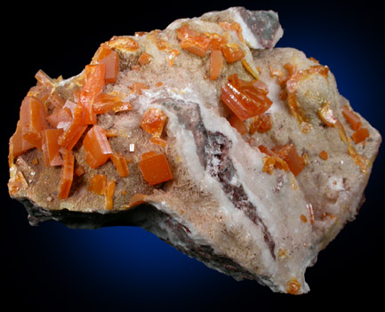 Wulfenite on Calcite from Ahumada Mine, Sierra de Los Lamentos, Chihuahua, Mexico