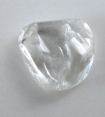 Diamond (0.60 carat flattened dodecahedral crystal) from Udachnaya Mine, Republic of Sakha (Yakutia), Siberia, Russia