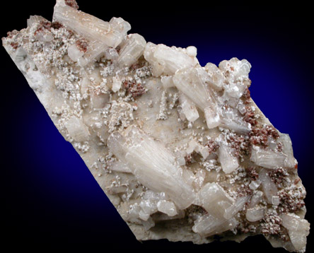 Natrolite, Gonnardite, Rhodochrosite, Feldspar from De-Mix Quarry, Mont Saint-Hilaire, Qubec, Canada