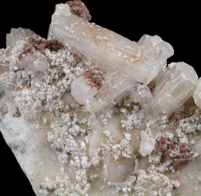 Natrolite, Gonnardite, Rhodochrosite, Feldspar from De-Mix Quarry, Mont Saint-Hilaire, Qubec, Canada