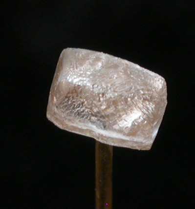 Diamond (0.43 carat pale brown elongated crystal) from Kelsey Lake Diamond Mine, Stateline District, Larimer County, Colorado