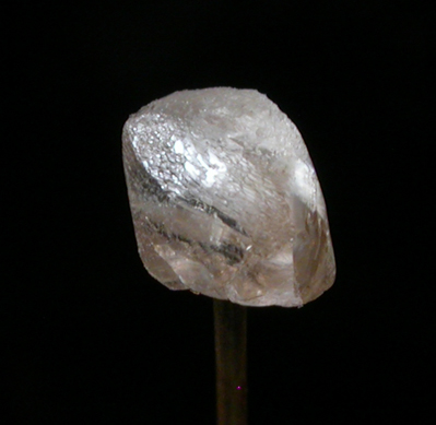 Diamond (0.43 carat pale brown elongated crystal) from Kelsey Lake Diamond Mine, Stateline District, Larimer County, Colorado