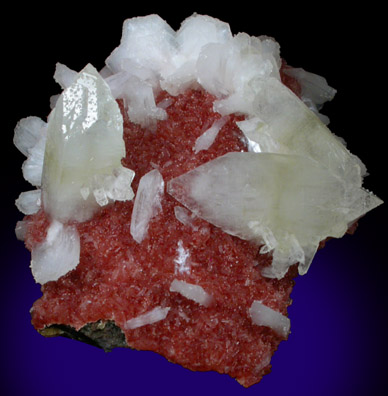 Apophyllite and Stilbite-Ca on red Heulandite from Mirzapur, Uttar Pradesh, India