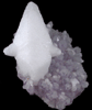 Calcite (twinned crystals) on Amethyst from Guanajuato, Mexico