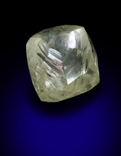 Diamond (0.84 carat yellow dodecahedral crystal) from Orapa Mine, south of the Makgadikgadi Pans, Botswana