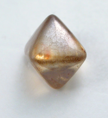 Diamond (0.85 carat brown octahedral crystal) from Oranjemund District, southern coastal Namib Desert, Namibia