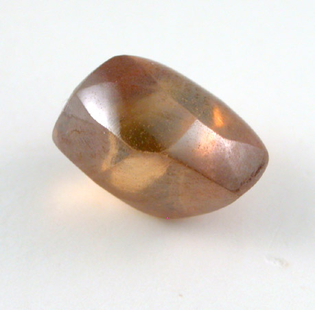 Diamond (1.70 carat orange-brown elongated crystal) from Oranjemund District, southern coastal Namib Desert, Namibia