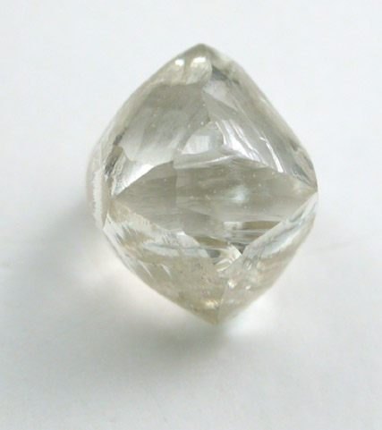Diamond (1.18 carat pale-yellow dodec-octahedral crystal) from Oranjemund District, southern coastal Namib Desert, Namibia