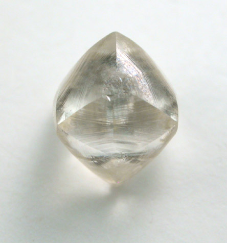 Diamond (1.22 carat pale-yellow octahedral crystal) from Oranjemund District, southern coastal Namib Desert, Namibia