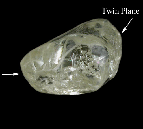 Diamond (4.45 carat yellow-gray macle-twin crystal) from Oranjemund District, southern coastal Namib Desert, Namibia