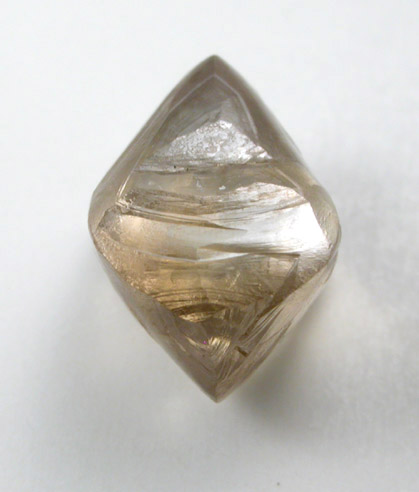 Diamond (2.67 carat gray-brown octahedral crystal) from Damtshaa Mine, near Orapa, Botswana