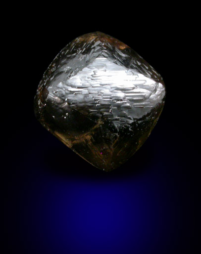 Diamond (2.99 carat dark-brown trisoctahedral crystal) from Damtshaa Mine, near Orapa, Botswana