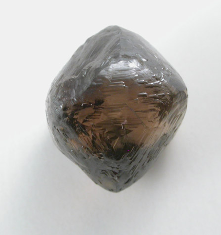 Diamond (2.99 carat dark-brown trisoctahedral crystal) from Damtshaa Mine, near Orapa, Botswana