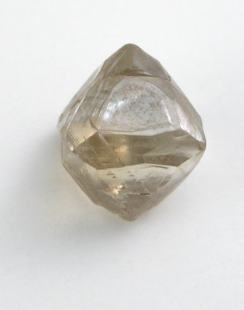 Diamond (0.69 carat brown octahedral crystal) from Oranjemund District, southern coastal Namib Desert, Namibia