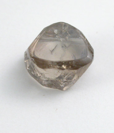 Diamond (0.66 carat brown octahedral crystal) from Oranjemund District, southern coastal Namib Desert, Namibia