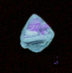 Diamond (0.70 carat yellow-green octahedral crystal) from Mirny, Republic of Sakha (Yakutia), Siberia, Russia